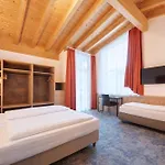 Отель Alpenland 4*